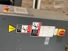 Used Lantech Automatic Stretch Wrapper, Model Q1000. Machine includes on board static eliminator, powered roller pallet indexing, touch-screen operator panel and automatic cut-off. 3/60/460V.