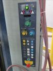 Used Lantech Stretch Wrapper, Model Q1000 Serial # QA 002180.  Automatic operation with powered infeed and discharge pallet conveyors, 18