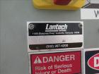 Used Lantech Stretch Wrapper, Model Q1000 Serial # QA 002180.  Automatic operation with powered infeed and discharge pallet conveyors, 18