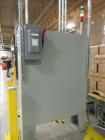 Used Lantech Model S-2500 Automatic Straddle Stretch Wrapper Line. Capable of speeds from 60 - 80 loads per hour (depending on application). Maximum load size: 58