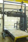 USED: Lantech stretch wrapper, series converted, products model SHASP.               Unit complete with Allen Bradley PLC, 10' powered chain driven live roller conveyor, auto stretch wrapping complet...