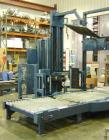 USED: Lantech stretch wrapper, series converted, products model SHASP.               Unit complete with Allen Bradley PLC, 10' powered chain driven live roller conveyor, auto stretch wrapping complet...