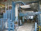 USED: Lantech stretch wrapper, series converted, products model SHASP.               Unit complete with Allen Bradley PLC, 10' powered chain driven live roller conveyor, auto stretch wrapping complet...