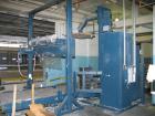 USED: Lantech stretch wrapper, series converted, products model SHASP.               Unit complete with Allen Bradley PLC, 10' powered chain driven live roller conveyor, auto stretch wrapping complet...