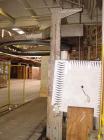 Used Muller Stretch Wrapper, Model Octopus202. Capable of speeds up to 50 loads per hour. Will run up to 4800 lb loads. Includes automatic and manual wrapping modes, power roller pallet conveyor, AC ...