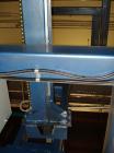 Used Cousins Automatic Stretch Wrapper, Model 7100-65-OHA. The Series 7100 fully automatic conveyorized overhead spiral stretch wrap systems will wrap up to 95 loads per hour, maximum load size 50” w...