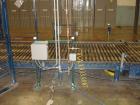 Used Cousins Automatic Stretch Wrapper, Model 7100-65-OHA. The Series 7100 fully automatic conveyorized overhead spiral stretch wrap systems will wrap up to 95 loads per hour, maximum load size 50” w...