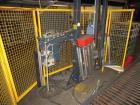 Used Wulftec Model WRT-150 Semi-automatic Rotary Arm (Orbital) Stretch Wrapper. Machine is capable of speeds up to 50 loads per hour. Has a maximum load size of 54