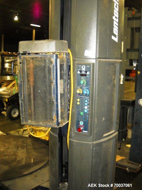 Used Lantech Stretch Wrapper, Q Series.  Approximately 48" diameter steel platform.  Controls with wrap counter, adjustable speed and wrapping force.