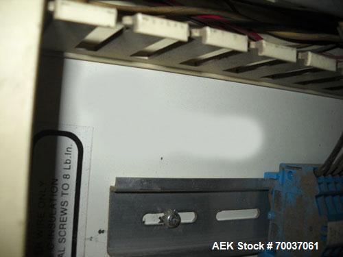 Used Lantech Stretch Wrapper, Q Series.  Approximately 48" diameter steel platform.  Controls with wrap counter, adjustable speed and wrapping force.