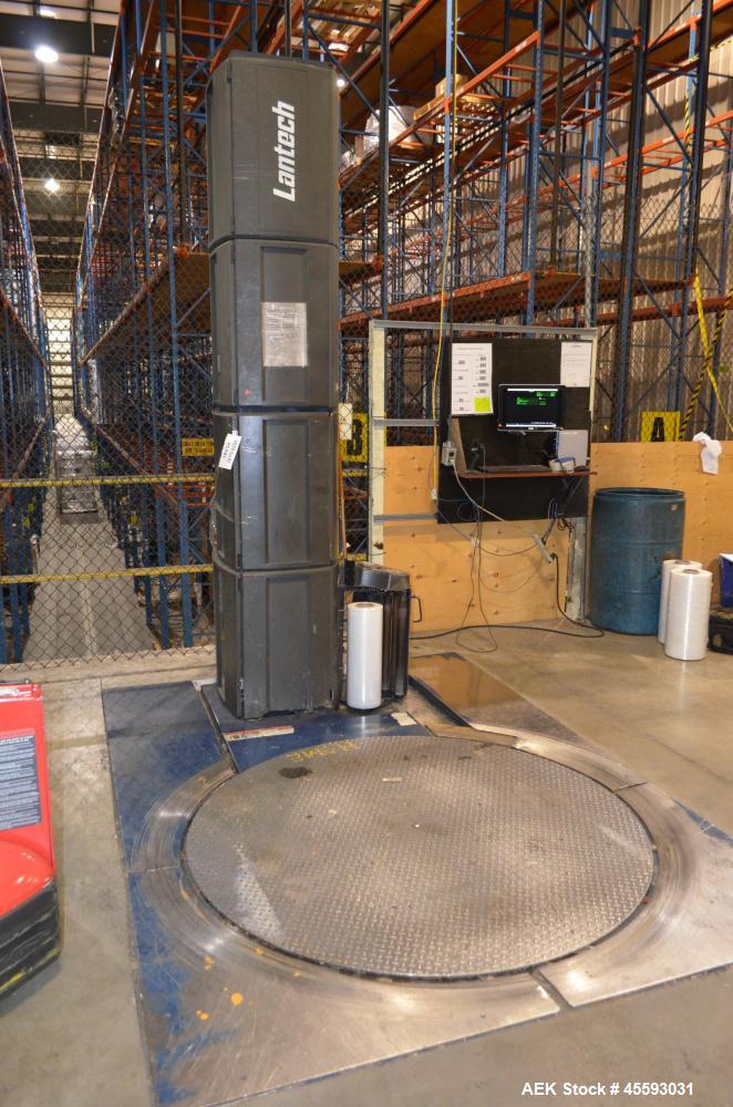 Used Lantech Model Q300 Stretch Wrapper. 65" Diameter turntable. 115 Volt, 14.9 amp, 50/60 hertz. In floor mounted. Serial#QM014710.