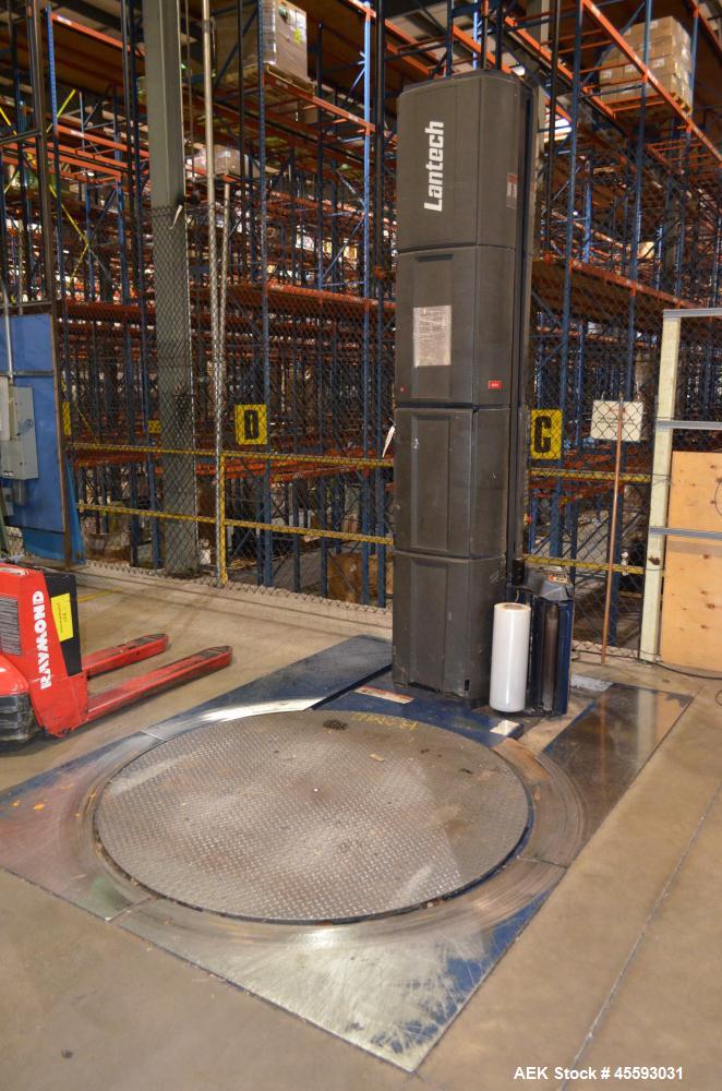 Used Lantech Model Q300 Stretch Wrapper. 65" Diameter turntable. 115 Volt, 14.9 amp, 50/60 hertz. In floor mounted. Serial#QM014710.