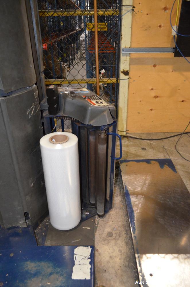 Used Lantech Model Q300 Stretch Wrapper. 65" Diameter turntable. 115 Volt, 14.9 amp, 50/60 hertz. In floor mounted. Serial#QM014710.