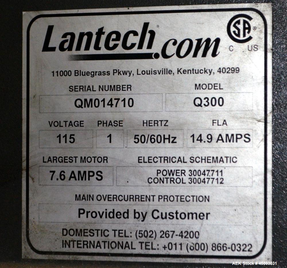 Used Lantech Model Q300 Stretch Wrapper. 65" Diameter turntable. 115 Volt, 14.9 amp, 50/60 hertz. In floor mounted. Serial#QM014710.