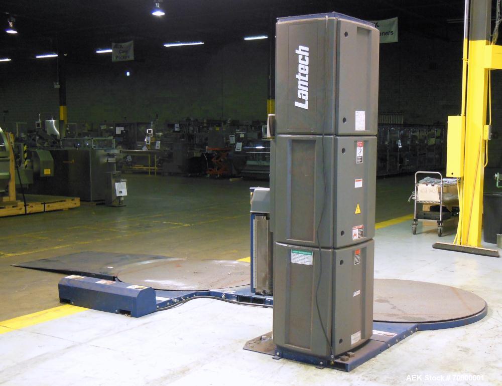 Used Lantech Q300 Semi-Automatic Dual truntable stretch wrapper. Low Profile unit capable of speeds from 25-35 loads per hour. Maximum load size 73 1/2", height 80", weight 4000 pounds. Has (2) 65" d...