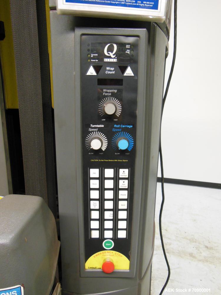 Used Lantech Q300 Semi-Automatic Dual truntable stretch wrapper. Low Profile unit capable of speeds from 25-35 loads per hour. Maximum load size 73 1/2", height 80", weight 4000 pounds. Has (2) 65" d...