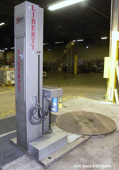 Used Liberty Industries Series 5.1 Semi-Automatic Stretch Wrapper. Capable of up to 30 loads per hour for spiral applicators. Includes a Pace series pre-stretch film delivery system, L70 controls, an...