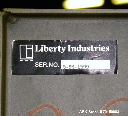Used Liberty Industries Series 5.1 Semi-Automatic Stretch Wrapper. Capable of up to 30 loads per hour for spiral applicators. Includes a Pace series pre-stretch film delivery system, L70 controls, an...
