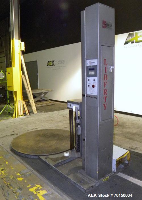 Used Liberty Industries Series 5.1 Semi-Automatic Stretch Wrapper. Capable of up to 30 loads per hour for spiral applicators. Includes a Pace series pre-stretch film delivery system, L70 controls, an...