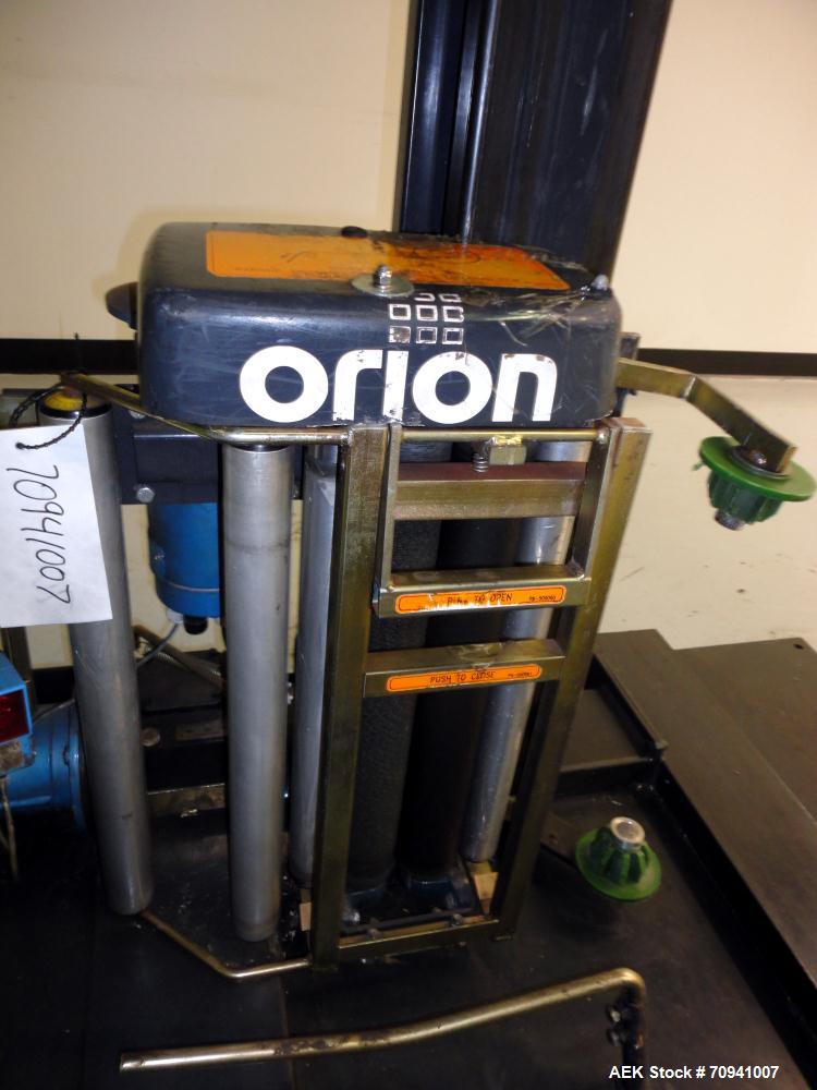 Used Orion L66/13S Semi Automatic Low Profile Stretch Wrapper. Turntable will do 0 - 14 RPM and is variable speed.  Maximum load capacity: up to 4,000 lbs. Film Roll Width: up to 20", 59" diameter tu...