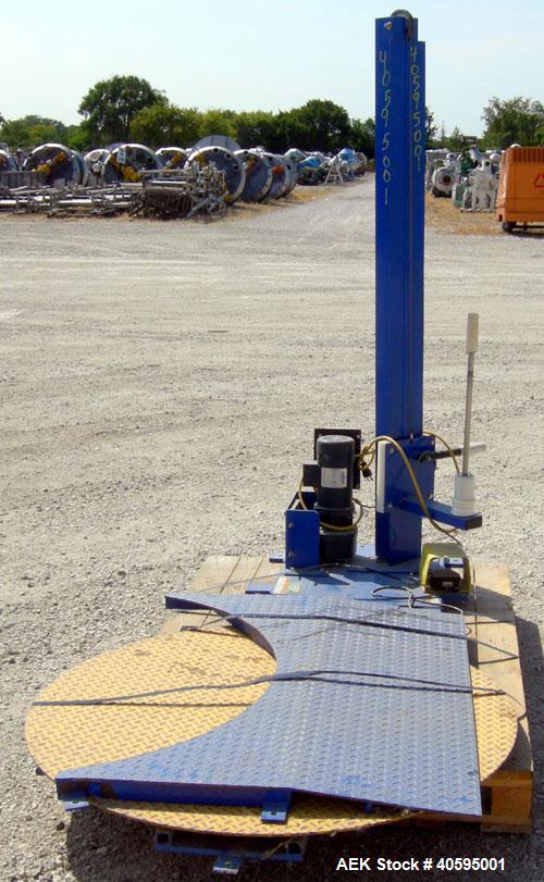 Used Vestil stretch wrapper, model SWA-48-R. 48" diameter turntable with approach ramp, 4000 pound load capacity. Can accommodate stretch film up to 11" diameter x 10 to 20" high.  Foot control. 1/2 ...
