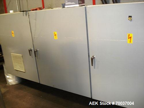 Used CERMEX Tray/Pad Shrinkwrapper, Model TSP70. Integrated tray/shrink machine capable of applying registered film at speeds up to 30 trays per minute on 12 and 24 packs. Includes Nordson 3400 hot m...