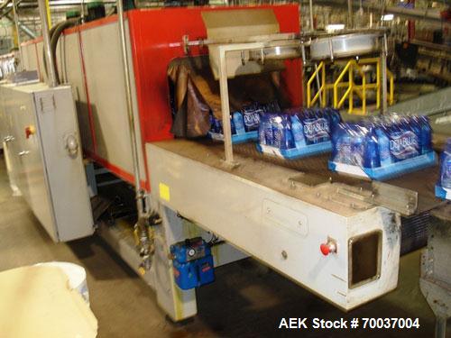 Used CERMEX Tray/Pad Shrinkwrapper, Model TSP70. Integrated tray/shrink machine capable of applying registered film at speeds up to 30 trays per minute on 12 and 24 packs. Includes Nordson 3400 hot m...