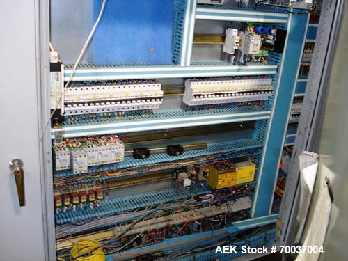 Used CERMEX Tray/Pad Shrinkwrapper, Model TSP70. Integrated tray/shrink machine capable of applying registered film at speeds up to 30 trays per minute on 12 and 24 packs. Includes Nordson 3400 hot m...