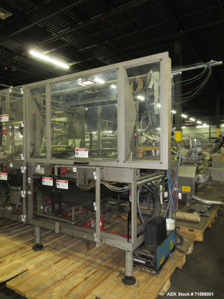 Used- Douglas Automatic Tray Former and Registered Shrink Film Bundler