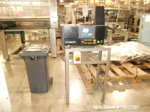Used Nigrelli, Model Envoy 125 (RH) High Speed Trayloader Packer. Previously used to pack 12oz 202/211 x 415 beverage cans in (2) lanes of 6-pack Hi-cone packs. Operator station including Allen-Bradl...