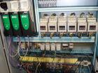 Used CERMEX Tray/Pad Shrinkwrapper, Model TSP70. Integrated tray/shrink machine capable of applying registered film at speeds up to 30 trays per minute on 12 and 24 packs. Includes Nordson 3400 hot m...