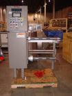 Used Douglas High Speed Bundler, Model MW7-1124 Multi Wrapper. Dual lane, 70 cycle/minute. 480 VAC, 60 hz. Machine has very low operating hours, approximately 200. Machine bundles 4 packs of 2.361