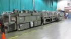 Used Standard Knapp, Model 296P, Continuous Tray Packer and Shrink Wrapper.