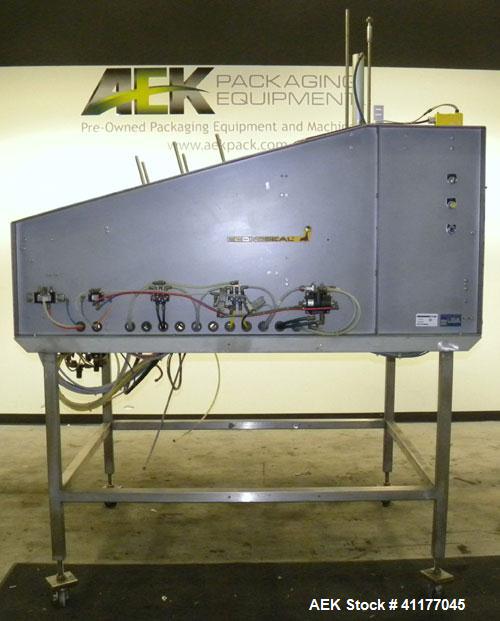 Used Econocorp Econoseal Automatic Tray Former, Model 7228, Carbon Steel. Capable of speeds up to 20 trays per minute. Has a tray size range: width 6" x 15", length 6" x 12", depth 1" to 5". Maximum ...