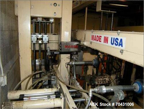 Used Marq Packaging Model HPT-LF/LH/AB Tray Forming System with extended blank magazine with powered chain drive, AB Dtam HMI. Missing and will require an AB PLC 504 installed by others. Hydraulic po...