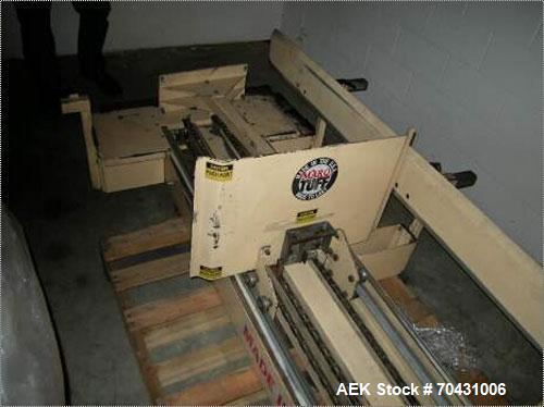 Used Marq Packaging Model HPT-LF/LH/AB Tray Forming System with extended blank magazine with powered chain drive, AB Dtam HMI. Missing and will require an AB PLC 504 installed by others. Hydraulic po...