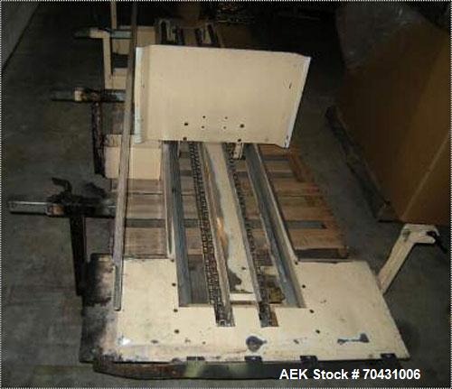 Used Marq Packaging Model HPT-LF/LH/AB Tray Forming System with extended blank magazine with powered chain drive, AB Dtam HMI. Missing and will require an AB PLC 504 installed by others. Hydraulic po...