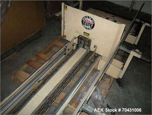 Used Marq Packaging Model HPT-LF/LH/AB Tray Forming System with extended blank magazine with powered chain drive, AB Dtam HMI. Missing and will require an AB PLC 504 installed by others. Hydraulic po...