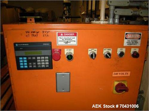 Used Marq Packaging Model HPT-LF/LH/AB Tray Forming System with extended blank magazine with powered chain drive, AB Dtam HMI. Missing and will require an AB PLC 504 installed by others. Hydraulic po...