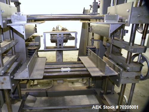 Used Marq Model HPT-MF/RH/DL High Performance Medium Frame Tray Former. Machine is capable of speeds up to 15 trays per minute.Direct Logics PLC and Nordson Problue 10 hot melt glue system. Has a tra...