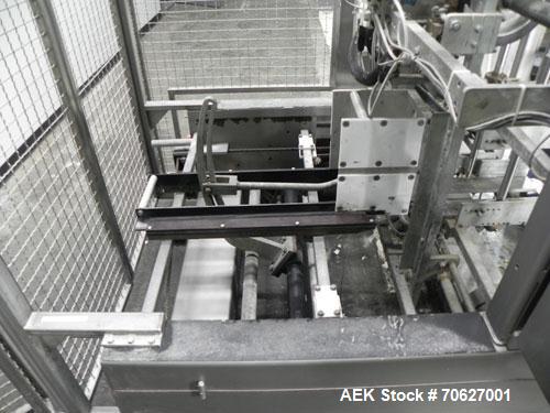 Used- SWF Model 1T4 Trayformer. Stainless steel frame capable of speeds up to 35 trays per miniute depending on case size.Ha...