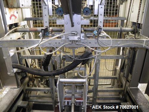 Used SWF Model 1T4 Trayformer. Stainless steel frame capable of speeds up to 35 trays per miniute depending on case size.Has a tray size range:7" to 34" long, 8-1/8" to 22" wide, 1" - 12" deep with p...