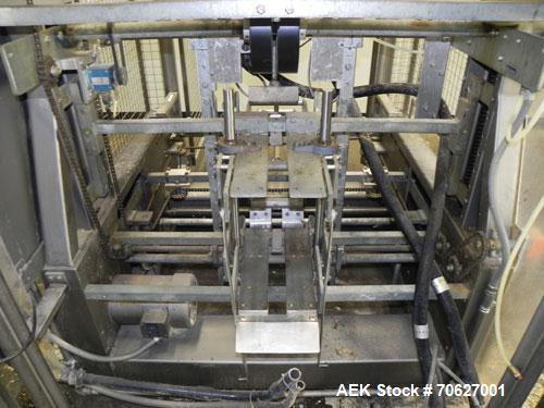 Used SWF Model 1T4 Trayformer. Stainless steel frame capable of speeds up to 35 trays per miniute depending on case size.Has a tray size range:7" to 34" long, 8-1/8" to 22" wide, 1" - 12" deep with p...