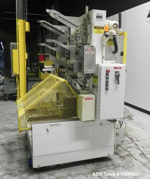 Used SWF Model 1T4 Glue Tray Former with Lidder. Glue tray former capable of speeds up to 35 trays per minute depending on case size. Has vacuum blank tray pick up. Has a tray size range: 7" to 34" l...