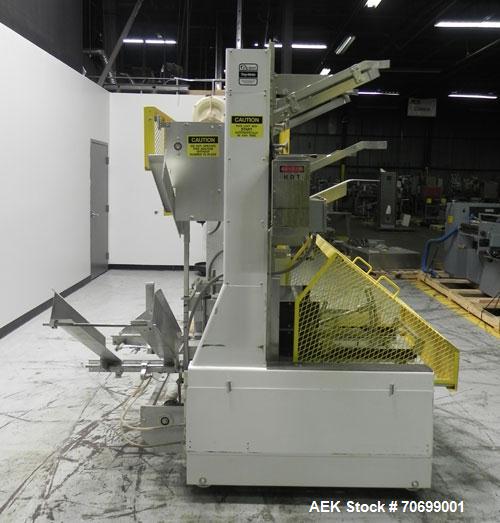 Used SWF Model 1T4 Glue Tray Former with Lidder. Glue tray former capable of speeds up to 35 trays per minute depending on case size. Has vacuum blank tray pick up. Has a tray size range: 7" to 34" l...
