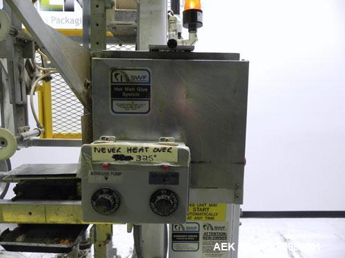 Used SWF Model 1T4 Glue Tray Former with Lidder. Glue tray former capable of speeds up to 35 trays per minute depending on case size. Has vacuum blank tray pick up. Has a tray size range: 7" to 34" l...