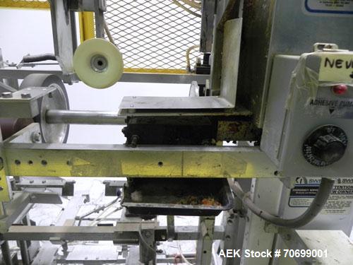 Used SWF Model 1T4 Glue Tray Former with Lidder. Glue tray former capable of speeds up to 35 trays per minute depending on case size. Has vacuum blank tray pick up. Has a tray size range: 7" to 34" l...