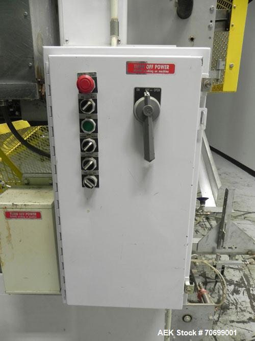 Used SWF Model 1T4 Glue Tray Former with Lidder. Glue tray former capable of speeds up to 35 trays per minute depending on case size. Has vacuum blank tray pick up. Has a tray size range: 7" to 34" l...