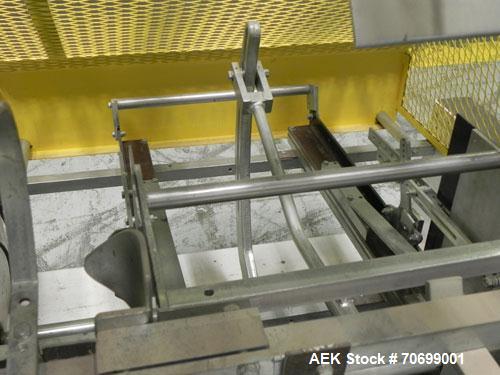 Used SWF Model 1T4 Glue Tray Former with Lidder. Glue tray former capable of speeds up to 35 trays per minute depending on case size. Has vacuum blank tray pick up. Has a tray size range: 7" to 34" l...