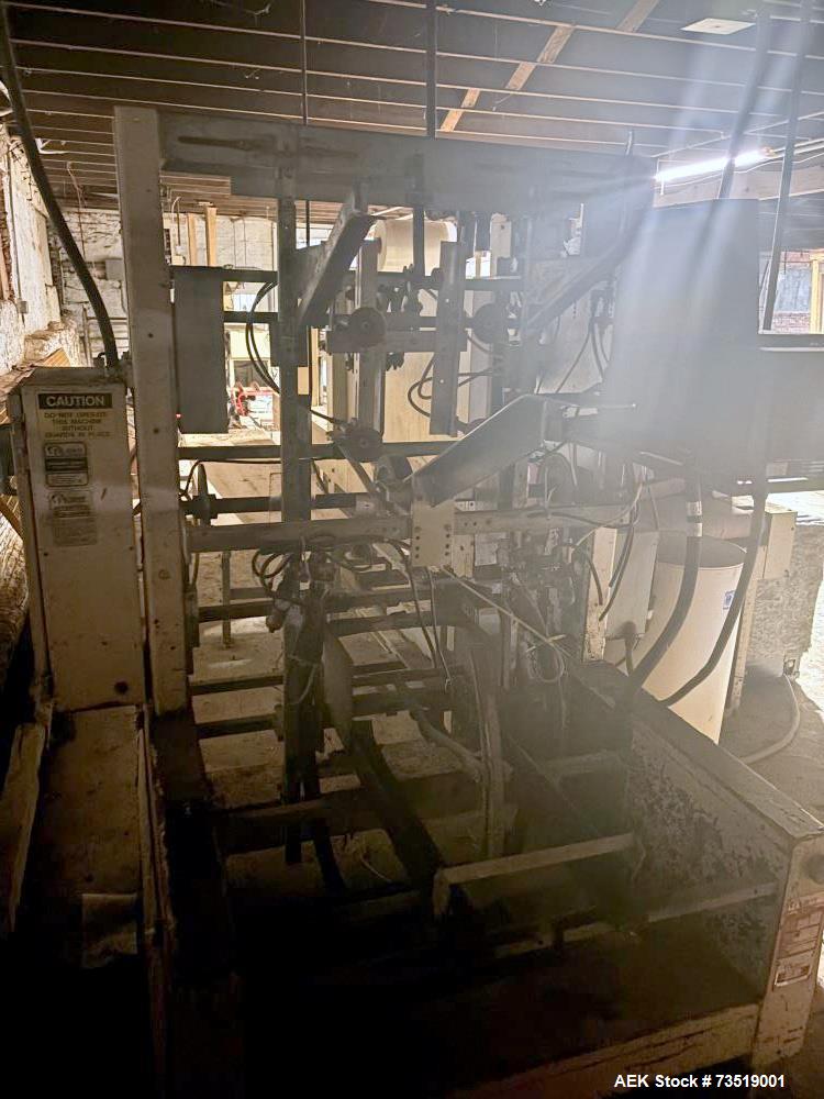 Used SWF Glue Seal Tray Former, Model IT4. Machine is capable of speeds up to 35 Trays per minute (depending on case size). Has a tray size range: 7" to 34" L, 8-1/8"-22"W, 1"-12"D w/ proper change p...